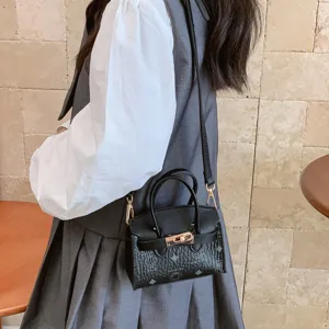 Bonito bolso bandolera mini para niños, bolso negro con estampado de dibujos y asa.