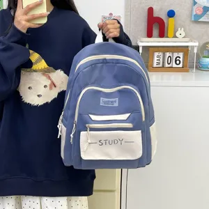 Casual blue and white student backpack, large capacity high school bookbag for daily use.