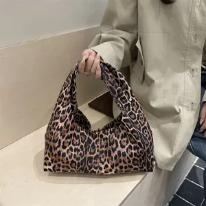Leopard print casual handbag for women, large capacity soft tote bag for daily fashion wear.