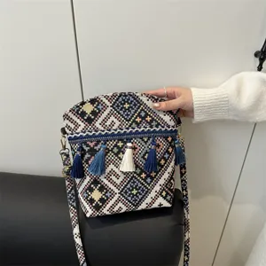 Sac à bandoulière tissé style ethnique vintage avec glands, design décontracté grande capacité.