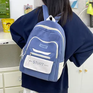 Detail view of the Korean style casual student backpack, large capacity blue school bag in use.