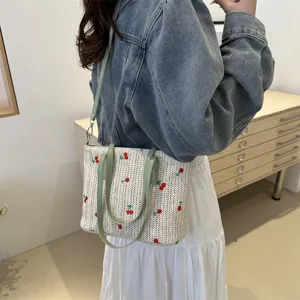 Woven straw shoulder tote bag with cute embroidery for summer travel daily commute chic style.