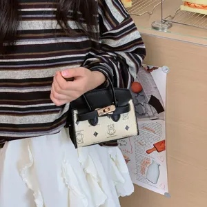 Bolso de mano con estampado de osito de dibujos animados para niños bonito bolso cruzado de cuero.