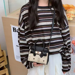 Bonito bolso cruzado para niños con estampado de dibujos animados, mini bolso elegante.