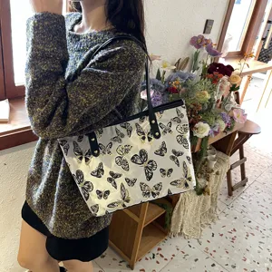 Details of women casual large capacity shoulder tote bag featuring black gold butterfly jacquard.
