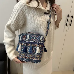 Sac à bandoulière tissé de style ethnique avec pampilles, sac rétro décontracté pour femme.