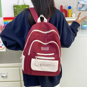 Detailed view of the Korean style casual student backpack, large capacity red design.