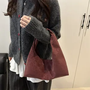 Detailed view of the casual burgundy leopard print hobo handbag for daily fashion wear.