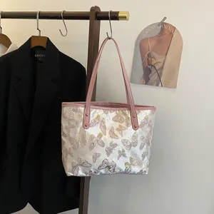 Casual large capacity shoulder tote bag with pink trim and white butterfly jacquard fabric.