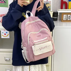 Pink casual student backpack with large capacity, waterproof style for high school daily use.