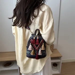 Ethnic style woven small backpack with multi-colored tassels, casual vintage daily mini bag.