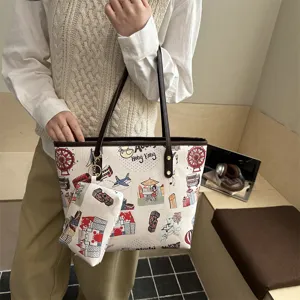 Detail view of women's canvas tote bag with urban doodle print and matching pouch.