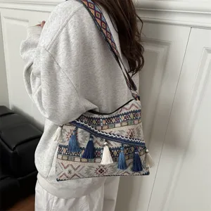 Ethnic retro shoulder crossbody bag with woven geometric pattern and tassel decoration for women