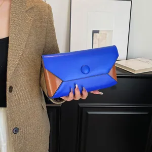 Elegant blue and brown color block envelope clutch bag, stylish evening purse for women.