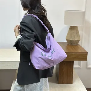 Casual purple letter print shoulder bag, large capacity lightweight commuter tote for women.