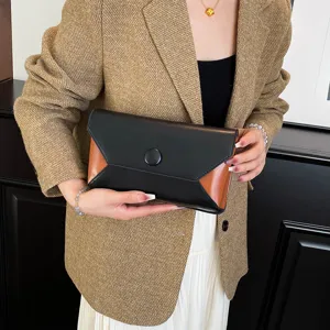 Elegant color block envelope clutch bag for women, stylish leather evening party handbag.