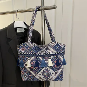Ethnic style woven tote bag with vintage tassel embroidery, large capacity shoulder commuting bag.