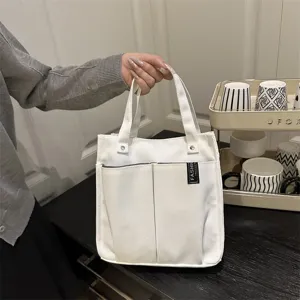Weisse Segeltuchtasche mit mehreren Fronttaschen Freizeit Handtasche fuer Alltag Arbeit
