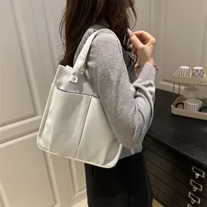 Lässige Canvas Tragetasche mit vielen Taschen praktischer Shopper Bag Detailansicht