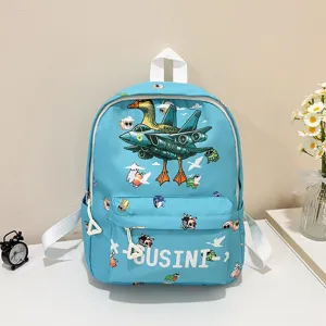 Detailed view of the cute blue kids backpack featuring cartoon print and front pocket design.