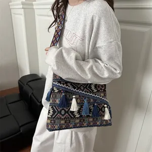 Ethnic style retro shoulder crossbody bag for women, canvas tassel design casual handbag.