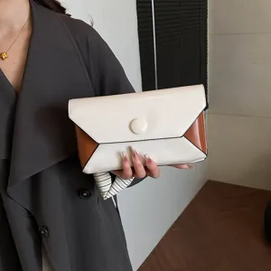 Stylish women color block clutch bag evening envelope purse elegant handbag with ribbon charm.