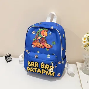 Detailed view of blue kids school backpack with cute cartoon print and front text design.