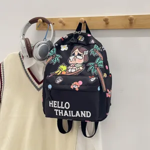 Cute cartoon print backpack detail view, casual school bag with front pocket design.