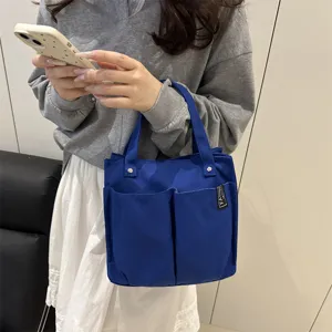 Blaues Canvas Tragetasche mit mehreren Taschen lässige Handtasche Studenten Lunchbag