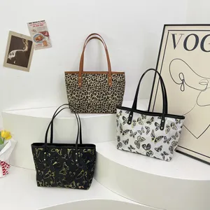 Detail view of casual women large capacity tote bags with leopard and butterfly jacquard.