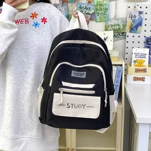 Detailed view of this casual student backpack featuring multi-pocket design and contrast trim.