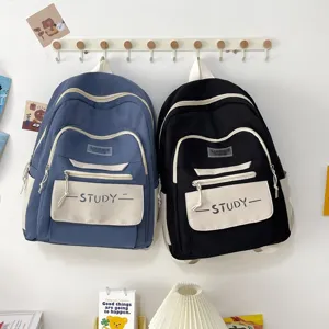 Casual large capacity student backpack, simple waterproof design for daily school use.