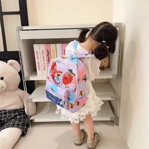 Children cartoon backpack with cute strawberry and shark print, large capacity school bag.