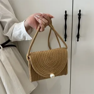 Handmade straw woven bag with pearl clasp, chic envelope shoulder bag for women daily wear.