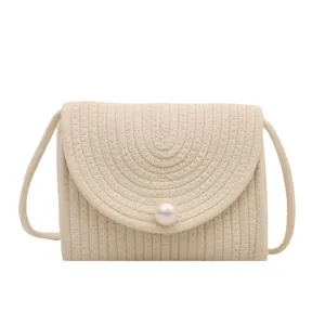 Beige woven crossbody bag for women, cute handmade cotton shoulder bag with pearl decor.