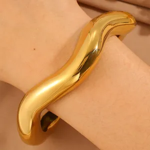 Chunky gold irregular open cuff bracelet, modern minimalist wide metal statement jewelry for women.
