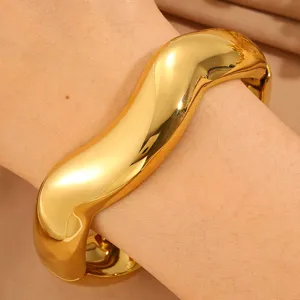 Stainless steel wide irregular wave open cuff bracelet, fashion punk gold jewelry design.