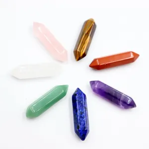 Detailed view of polished natural crystal chakra pillars set, healing stones for home decor.
