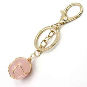 Gold wire wrapped rose quartz crystal keychain pendant fashion bag accessory charming decor