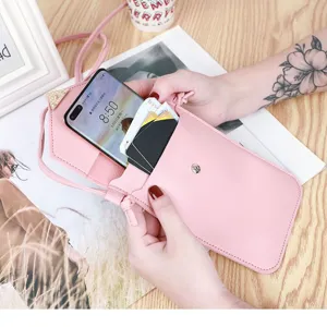 Pink PU leather mini crossbody phone bag with transparent touch screen pocket and card slots.