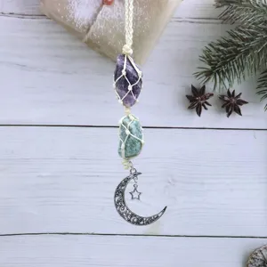 Handmade natural crystal macrame car hanging ornament with raw amethyst and moon charm.