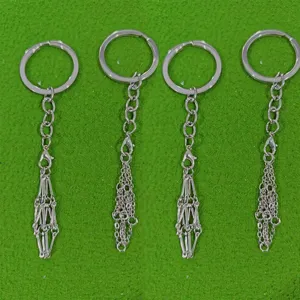 Metal stainless steel mesh bag pendant keychain minimalist fashion accessory for daily use.
