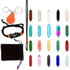 Natural crystal double terminated hexagon columns pendant set with pouch and accessories.