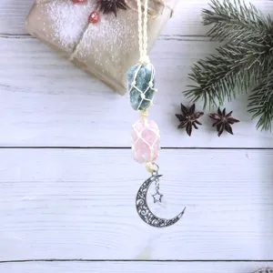 Handmade natural raw crystal stone hanging ornament with metal moon charm, boho decor.