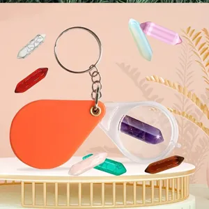 Crystal magnifying glass keychain and colorful gemstone pillar set for DIY decoration.