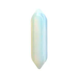 Close-up of a double-terminated crystal column pendant, bullet shape healing stone for DIY jewelry.