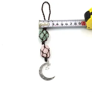 Handmade natural raw crystal stone hanging ornament with moon and star charm stones.