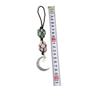 Handmade natural raw crystal car hanging pendant with moon and star net pocket design.