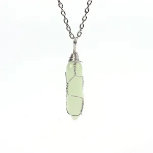 Handmade wire-wrapped green hexagonal crystal stone pendant necklace with silver chain for women.