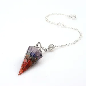 Close-up detail of the colorful crystal resin hexagonal cone pendulum pendant with silver chain.